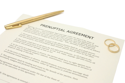 Pre Nup Agreement with contract and pen visible