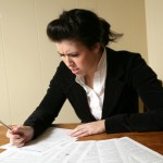 Woman confused while filling out tax form