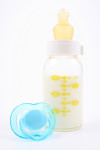 bottle of milk and pacifier