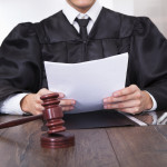 Judge Holding Documents