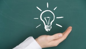 New idea concept. Man holding a good idea.