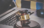 laptop-gavel-shutterstock_222579625-250