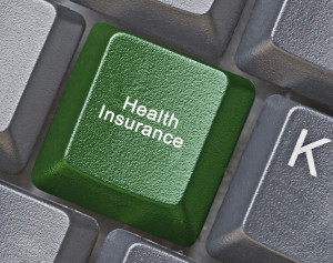 health insurance-computer key_493635611
