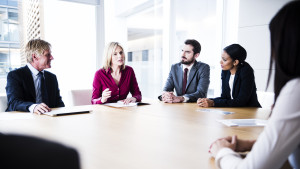 Confident businesswoman making her point in business meeting
