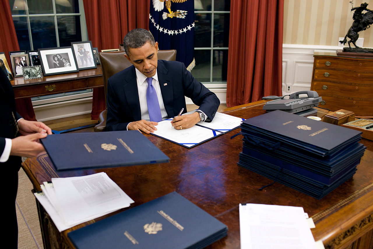 1280px-BarackObamaSigningLegislation
