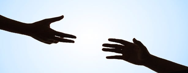 Silhouette of Helping Hands