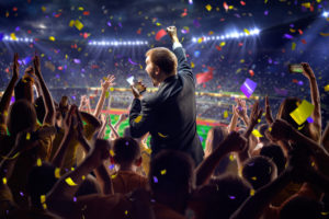 Fans on stadium game businessman