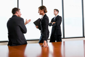Business people discussing strategy in boardroom