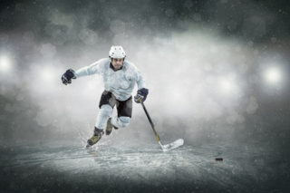 44532438 - ice hockey player on the ice, outdoors
