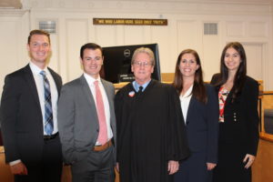 The first year associates with Judge Thornton after taking their oath.