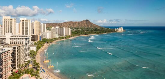 A memory of our 2017 vacation at Hawaii’s most popular beach - Waikiki. There’s only one like it, where the long sets of waves allow even the most inexperienced to hire a Malibu Longboard and give surfing a go. So much to enjoy in Waikiki, even with it’s popularity. Somehow people get absorbed into the many hotels, bars, shops, tours and, of course, the beach and Pacific Ocean. We hired a convertible Mustang to tour the island - great day out! (Photo taken from the Sheraton Hotel through glass)