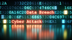 A close-up on an abstract design of a display, which is warning about a cyber attack. Multiple rows of hexadecimal code are interrupted by red glowing warning text. Part of the display is reflected on a shiny surface. The image can represent a variety of threats in the digital world: data theft, data leak, security breach, intrusion, etc...