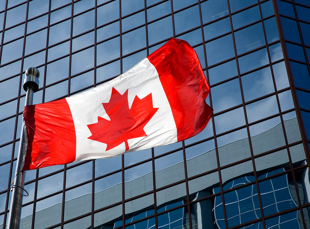 iStock_000006975570_Large Canada Canadian Flag Country International Building Reflective