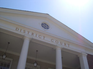 Gazing up at the pillars and roof of the district courthouse