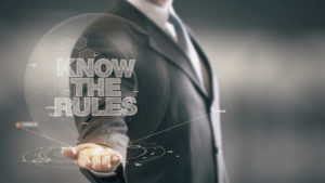 Know The Rules Businessman Holding in Hand New technologies