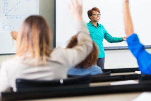 high school professor asking students to answer question