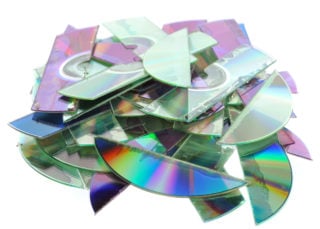 Destroyed CDs - shredded by a shredder.