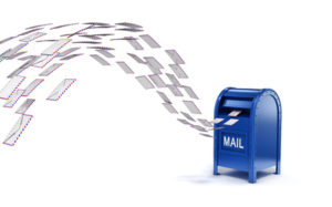 46059778 - letters flying into mail box