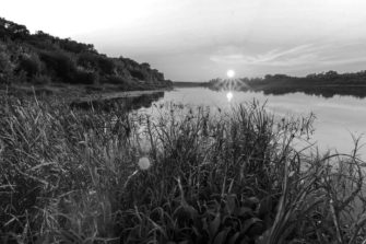 Scenic view of beautiful sunset above the river at summer