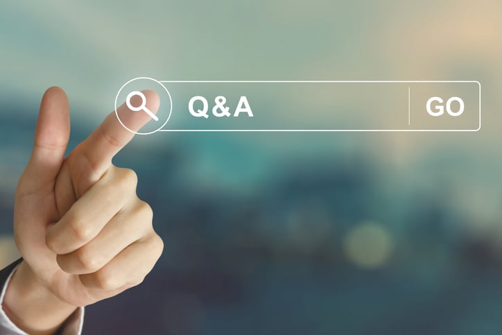 business hand clicking Q&A or Question and Answer button
