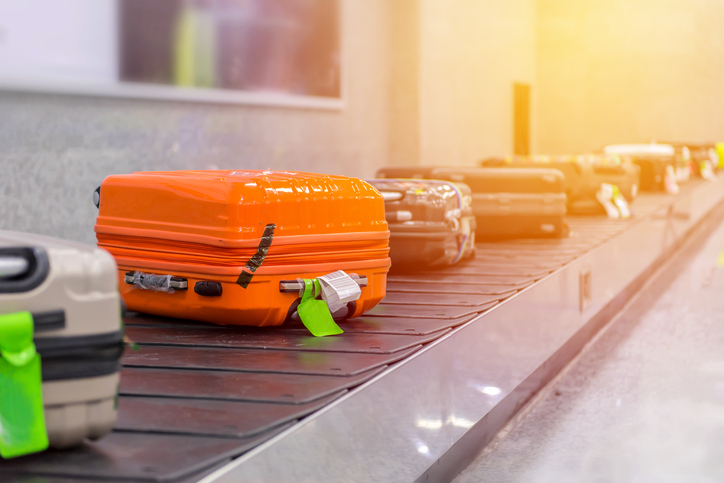 Suitcase or luggage with conveyor belt in the airport