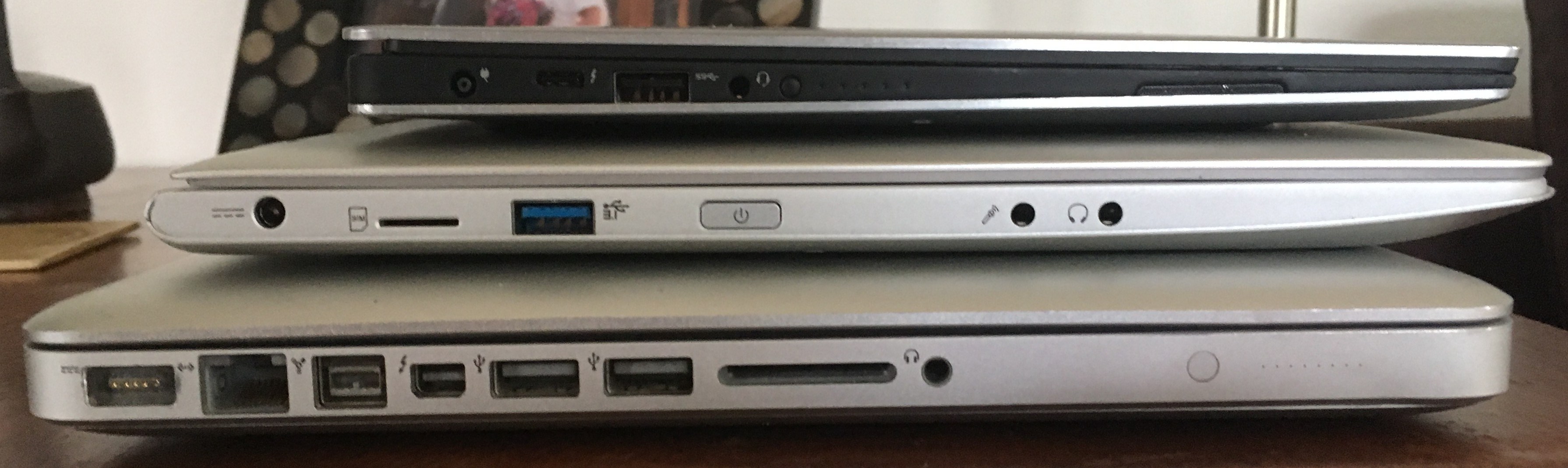 Side view of Dell XPS 13, Galago Pro, and 2011 MacBook Pro 13