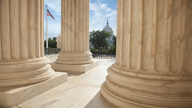 Supreme Court with Capitol in Background