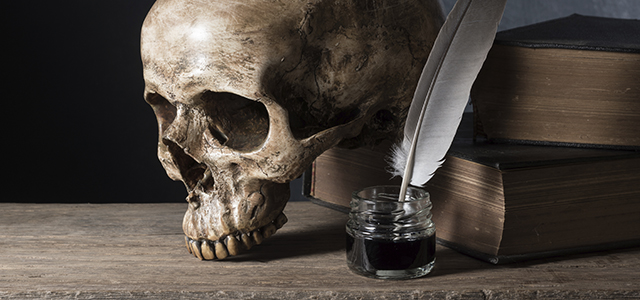 skull with inkwell