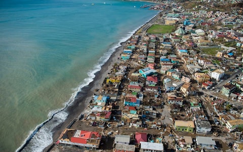 An aerial view of Roseau, capital of the Caribbean island Dominica, shows destruction on Thursday, three days after passage of Hurricane Maria.