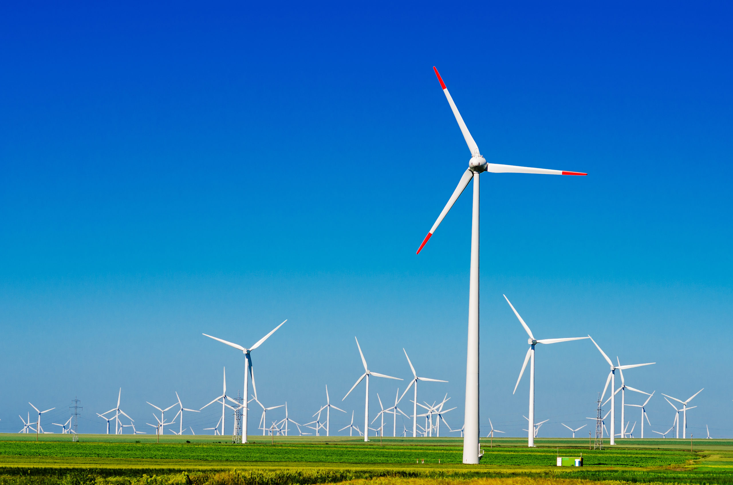 Energy_green meadow with Wind turbines