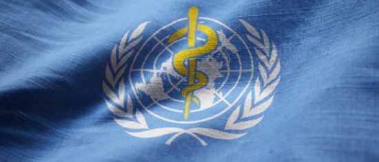 closeup-of-ruffled-world-health-organization-flag-picture-id1031822488