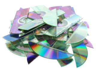 Destroyed CDs - shredded by a shredder.