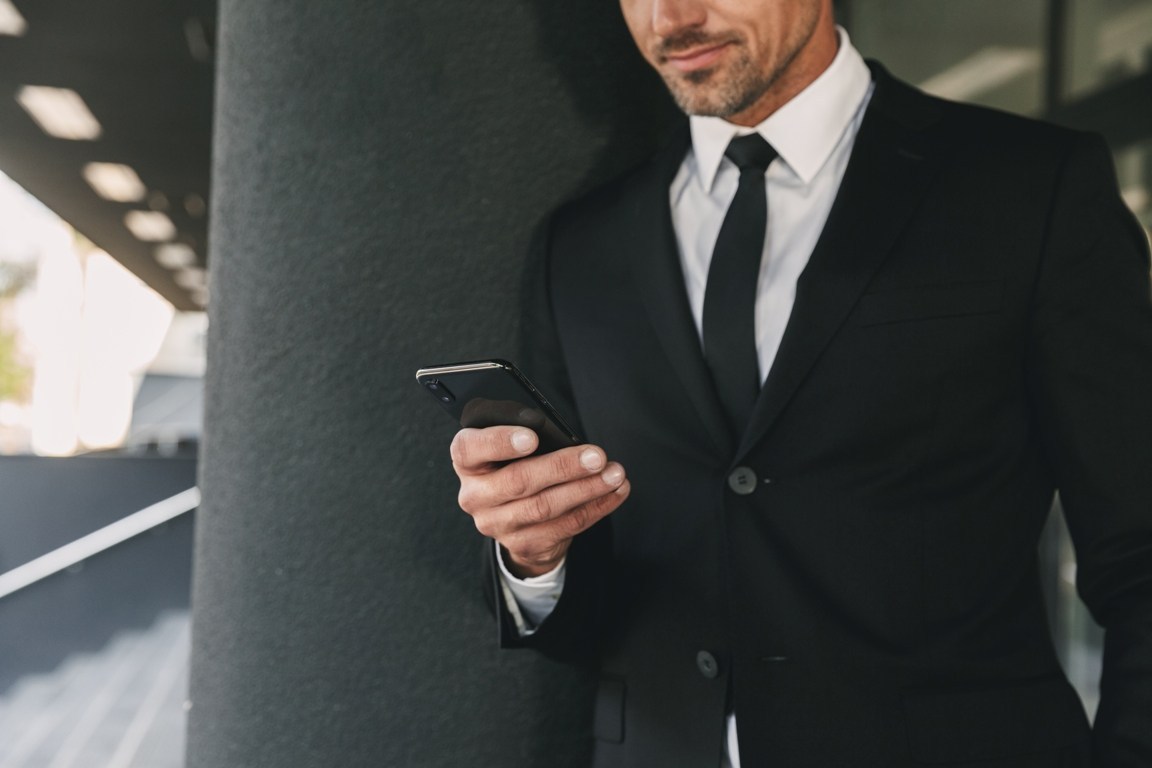 cropped-image-of-a-handsome-young-businessman-TM2USZQ.jpg