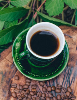 Green cup of coffee