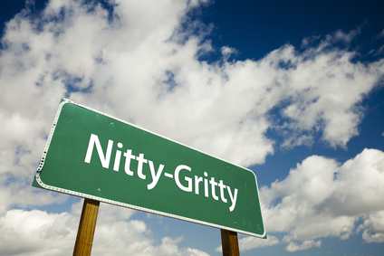 Nitty-Gritty Road Sign with dramatic clouds and sky.