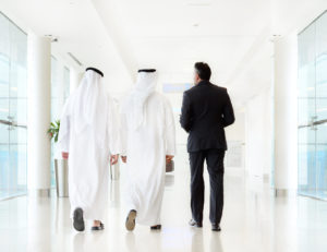 Business men walking and talking