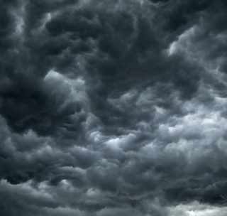 Threatening dark clouds covering the sky