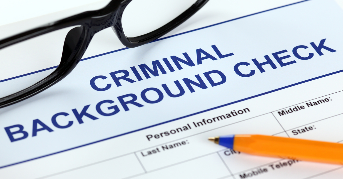 Criminal_background_check_form_glasses_pen_1200