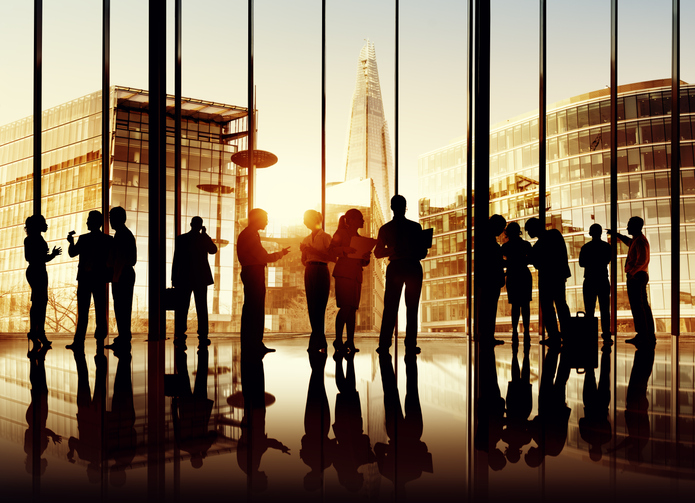 Sepia Toned Picture Of Silhouettes Of Multi-Ethnic Group Of Busi
