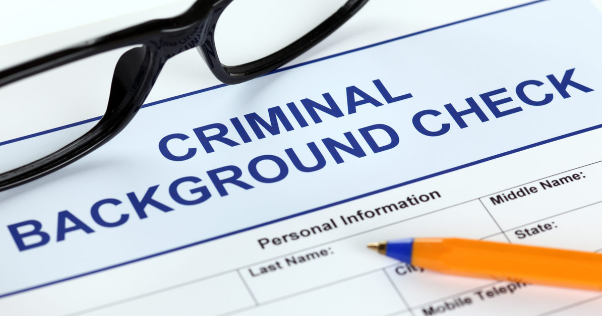 Criminal_background_check_form_glasses_pen_1200