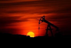 Oil rig at sunset
