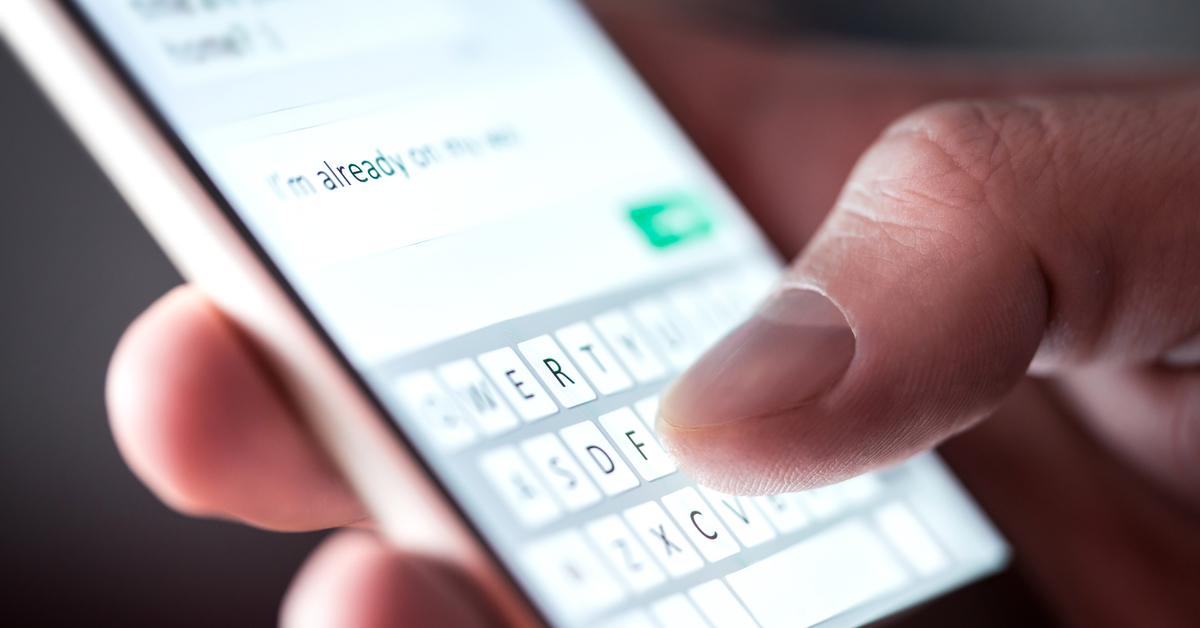 man_sending_text_smartphone_1200