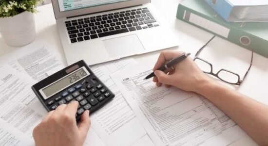 Accountant working with US tax forms