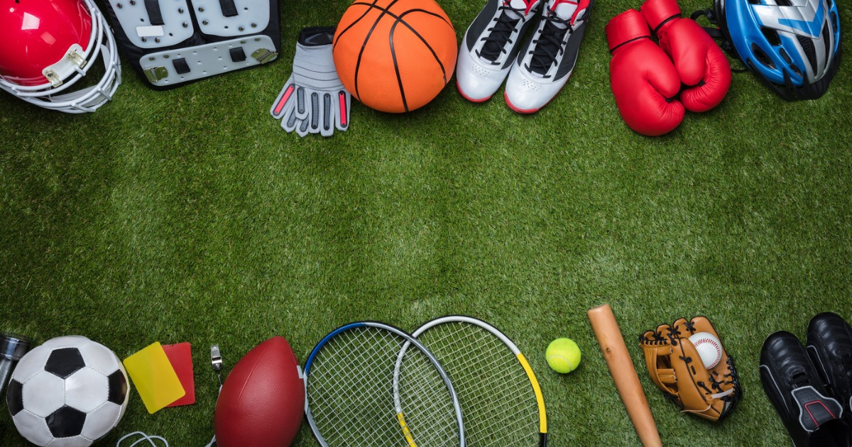 various-sport-equipments-on-grass-picture-id949190756