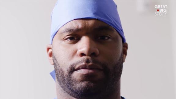A person wearing a hat
Description automatically generated