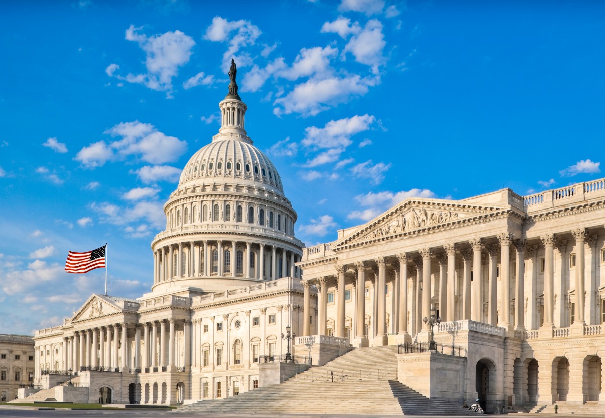 united-states-capitol-with-senate-chamber-under-blue-sky-picture-id182727706 (1)