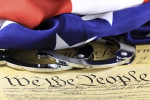Handcuffs and US flag