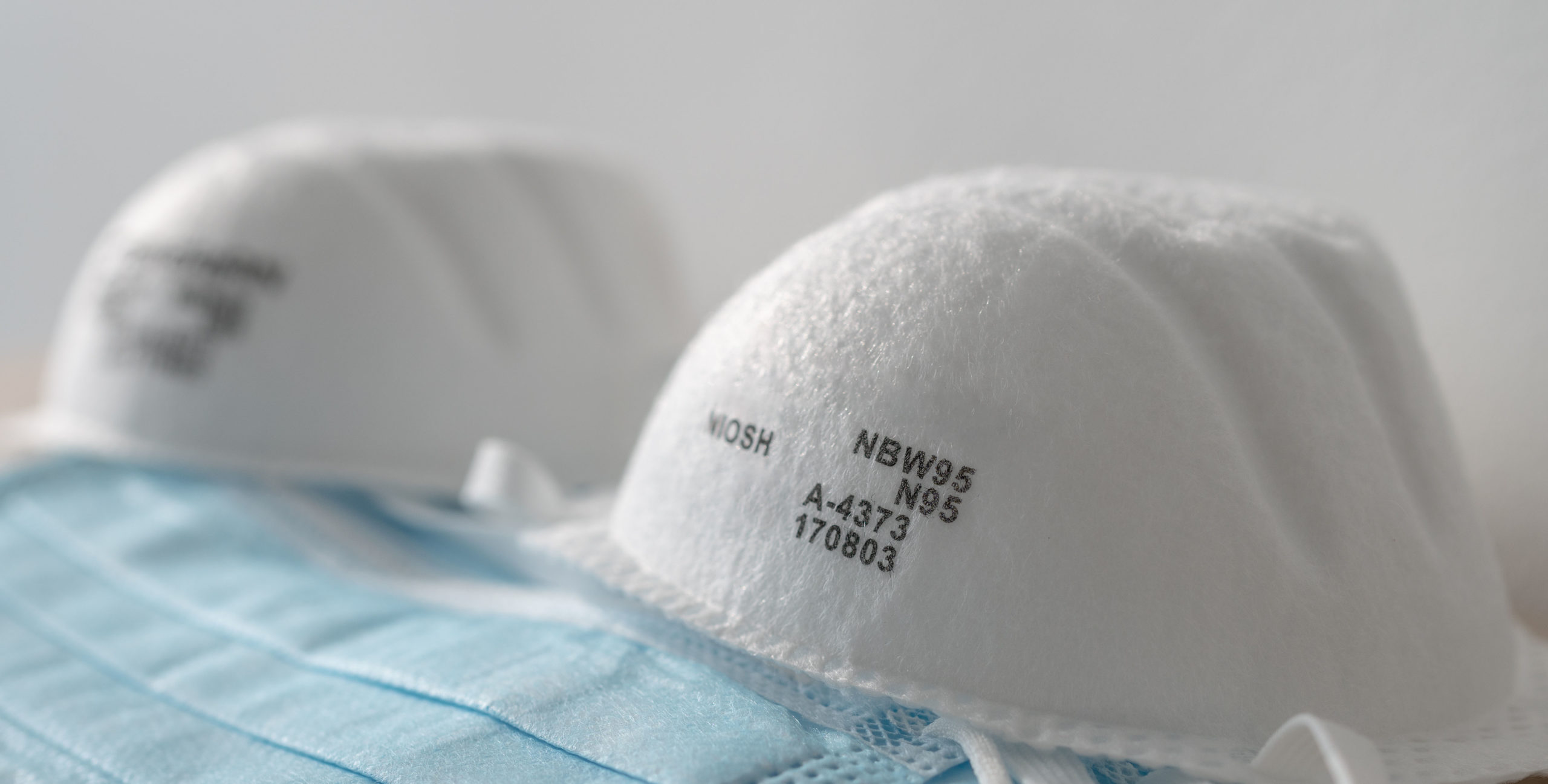 Corona virus prevetion face mask protection N95 masks and medical surgical masks selection panoramic banner.