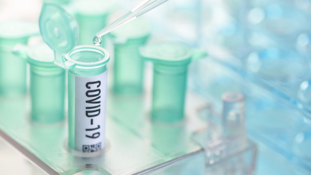 Corona virus: vial with pipette in laboratory