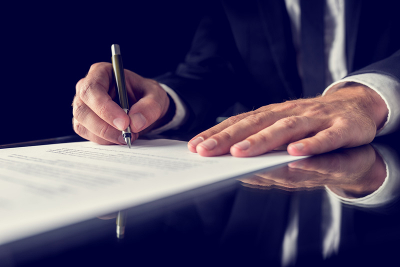 Businessman signs a contract